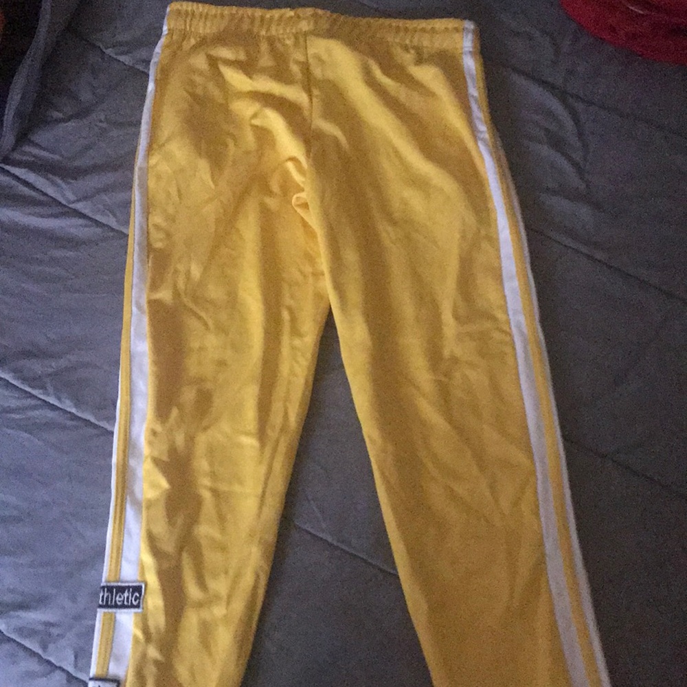 Bright yellow athletic sweatpants. Never worn.